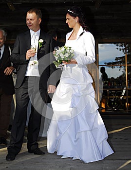 Newly wed welcoming guests photo