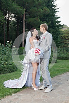 Newly wedded couple in the park