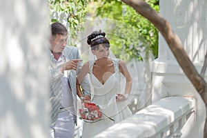 Newly wedded couple in the park