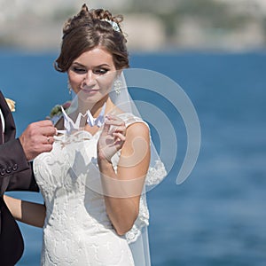 Newly wedded playing with origami cranes