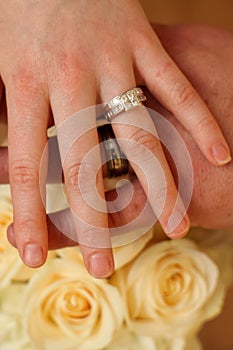 Newly Weds With Rings and Roses