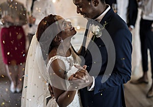 Newlywed African Descent Couple Dancing Wedding Celebration photo