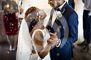 Newlywed African Descent Couple Dancing Wedding Celebration photo