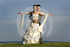 Newlywed couple in countryside