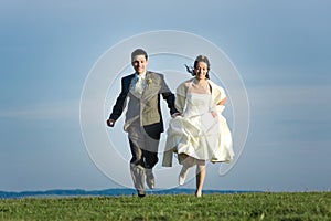 Newlywed couple in countryside