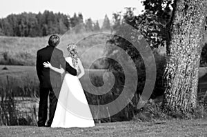 Newlywed couple in countryside