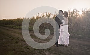 Newlywed couple in countryside