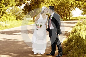 Newlywed couple kissing