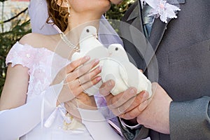 The newlyweds and dove.