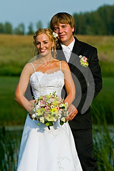 Newlyweds in formal pose