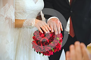 Newlyweds Hands on Peony Bouquet