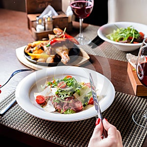 Newlyweds husband and wife have dinner in a cafe