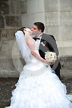 Newlyweds kissing