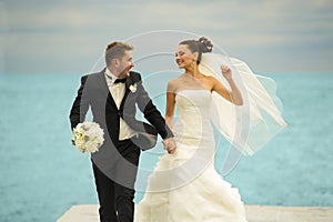 The newlyweds are piddling on the pier.