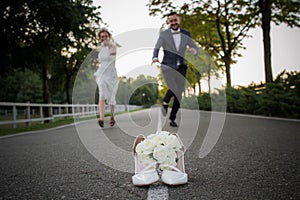 Newlyweds run to distill for a bouquet of brides