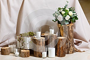 Newlyweds table setting decorated in rustic style. Nature theme in decoration