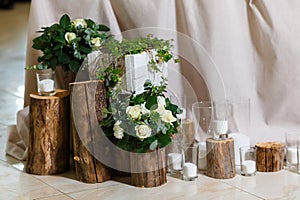 Newlyweds table setting decorated in rustic style. Nature theme in decoration