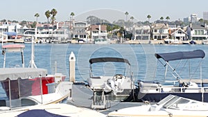 Newport beach harbor, weekend marina resort with yachts and sailboats, Pacific Coast, California, USA. Waterfront luxury