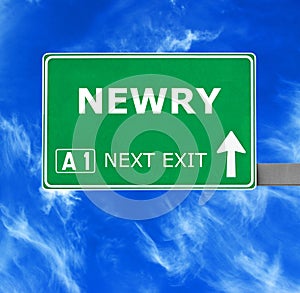 NEWRY road sign against clear blue sky