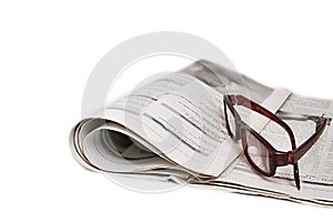 News paper with glasses