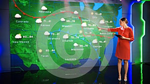 News Studio Live Weather Forecast: Professional Female Reporter / Meteorologist / Presenter Standi