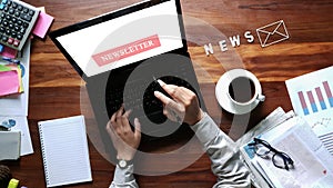 newsletter concept Hand of businessman checking message box on digital laptop Vintage tone filter