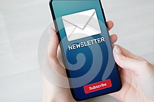 Newsletter subscription button on mobile phone screen. Business marketing concept.