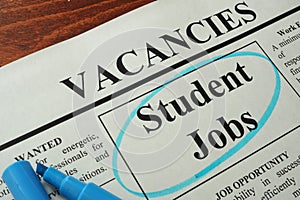 Newspaper with ads student jobs vacancy.