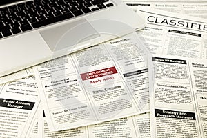 Newspaper with advertisements and classifieds ads