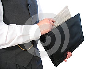 Newspaper in Briefcase