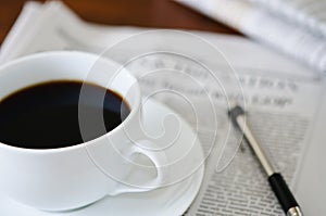 Newspaper and Coffee