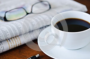 Newspaper, Coffee and Glasses 1
