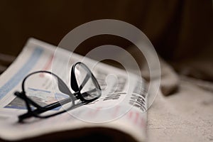 Newspaper and Glasses