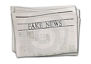 Newspaper with headline Fake News isolated on white background