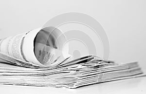 Newspaper rolled up