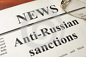 Newspaper with title Anti-Russian sanctions. photo