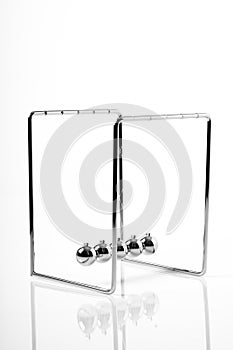 Newtons Cradle balancing balls, business concept