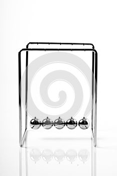 Newtons Cradle balancing balls, business concept