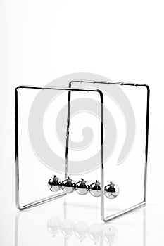 Newtons Cradle balancing balls, business concept