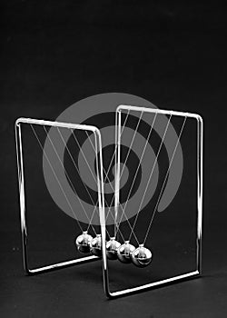 Newtons Cradle balancing balls, business concept