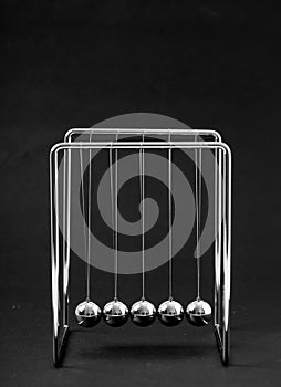 Newtons Cradle balancing balls, business concept