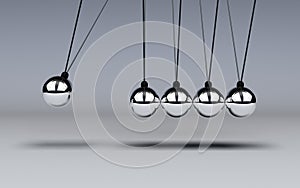 Newtons Cradle in motion photo