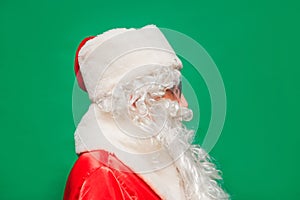 Newyear atmosphere presents, wear red santa costume sunglass headwear.  green color background