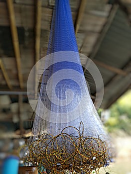 Newâ€‹ Fishing nets hanging onâ€‹ raft in Srinakarin Dam, Kanchanaburi Thailand.