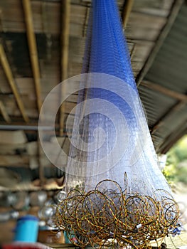 Newâ€‹ Fishing nets hanging onâ€‹ raft in Srinakarin Dam, Kanchanaburi Thailand.