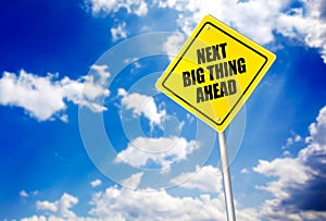 Next big thing ahead message on road sign