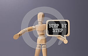 Next Steps Text on magnifying glass with keyboard and open notepad