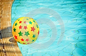 Nflatable ball floating in swimming pool
