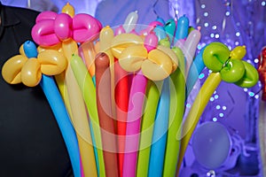 Nflatable balloons background, abstract festive backdrop, birthday celebration, long filled helium balloon, happy