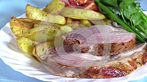 NFried pork neck with rustic potatoes
